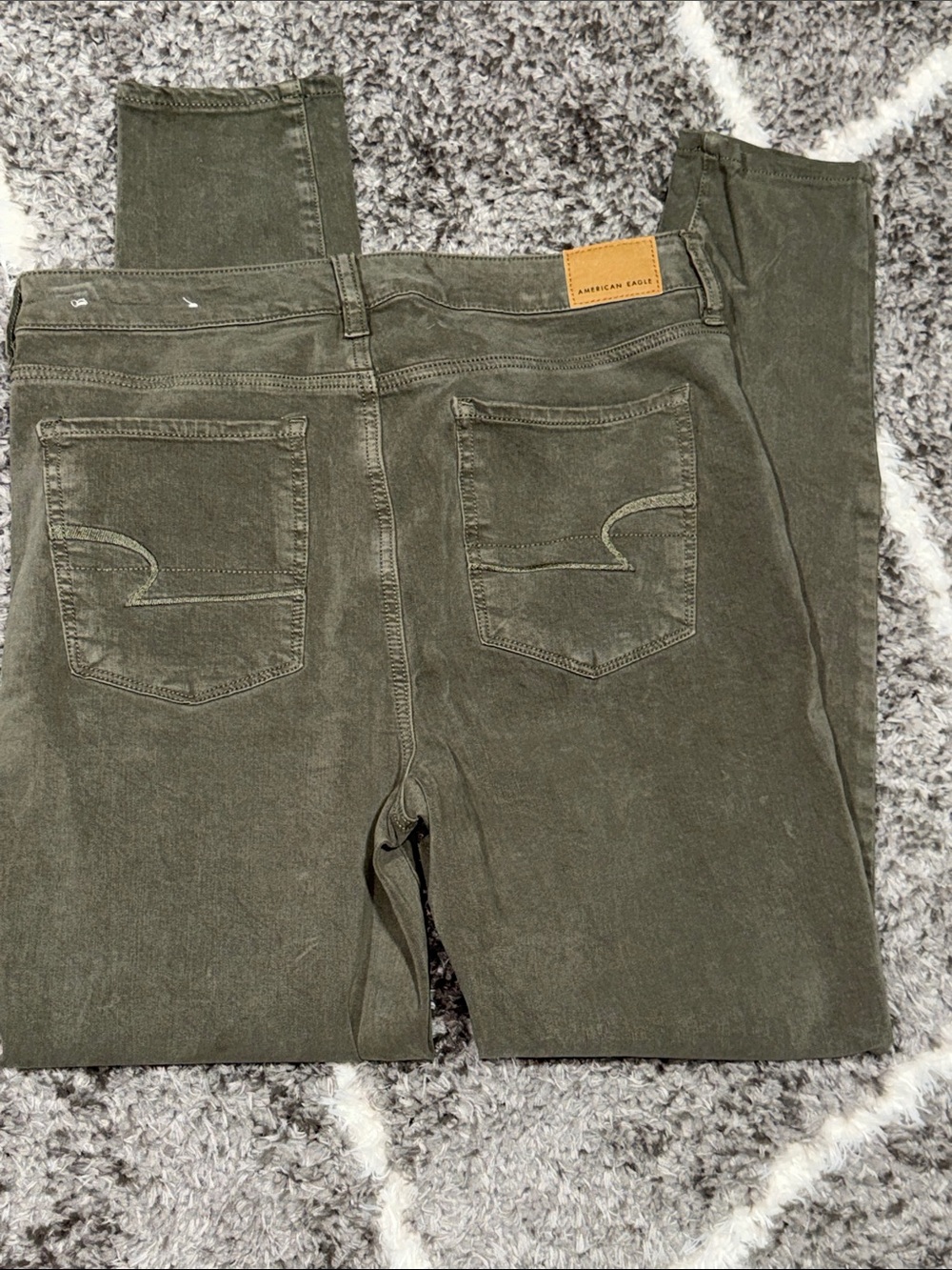 Size 10 AEO Olive 360 Next Level Stretch Super High Rise Jegging pant.
